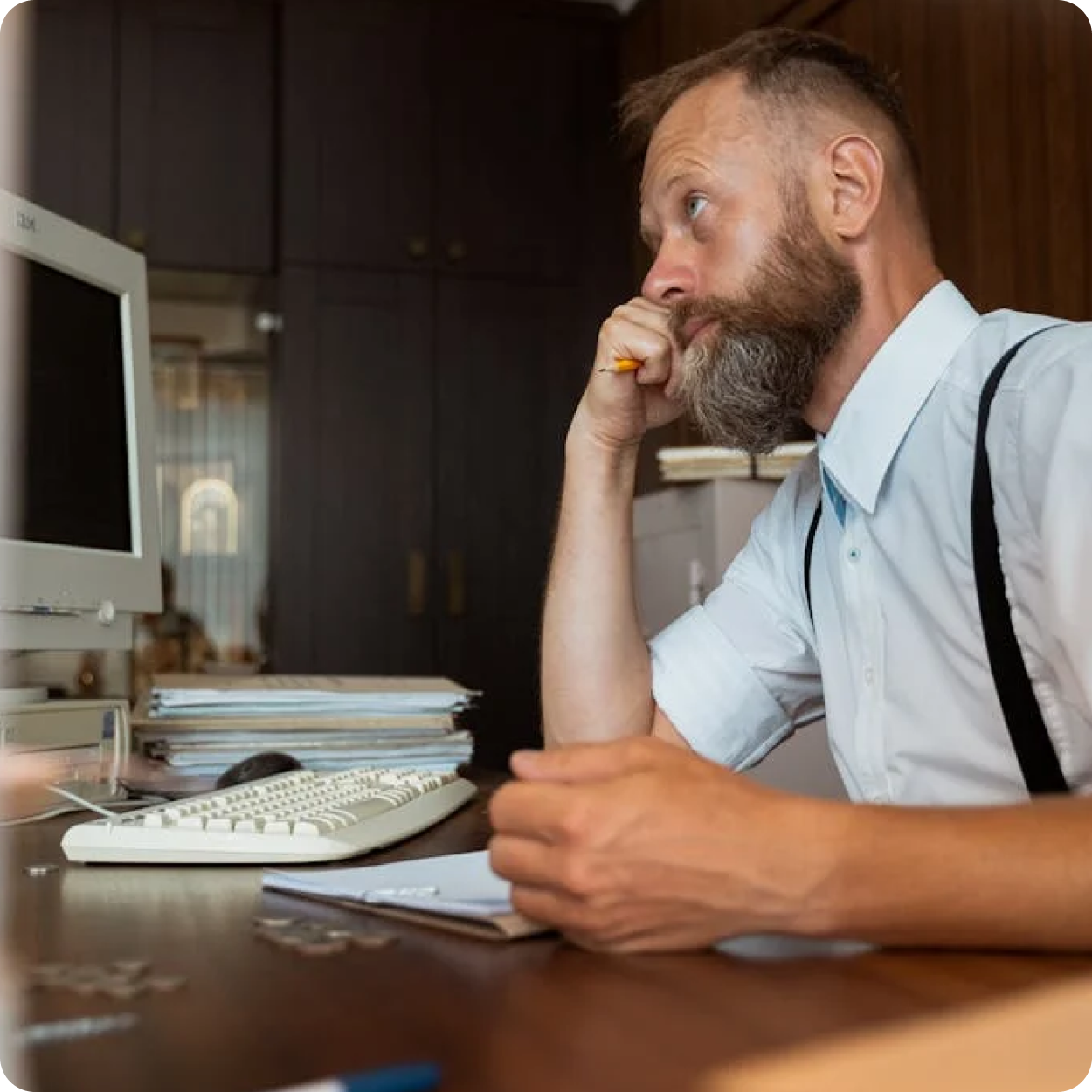 man-using-old-computer