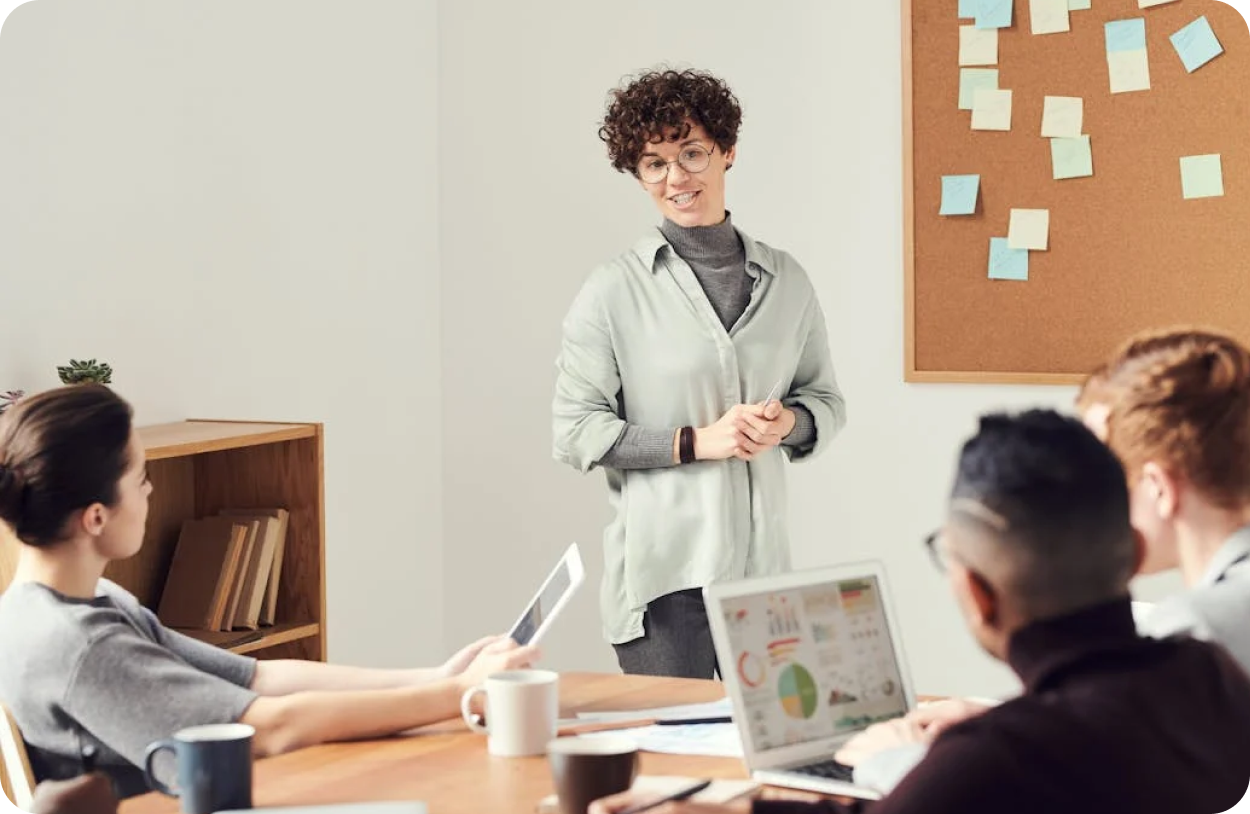 woman-presenting-in-a-meeting